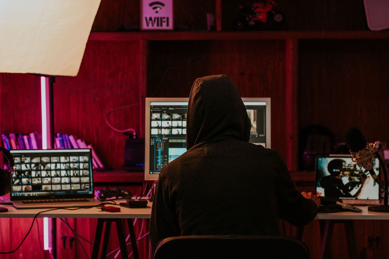 Content creator working on video editing setup for a faceless YouTube channel
