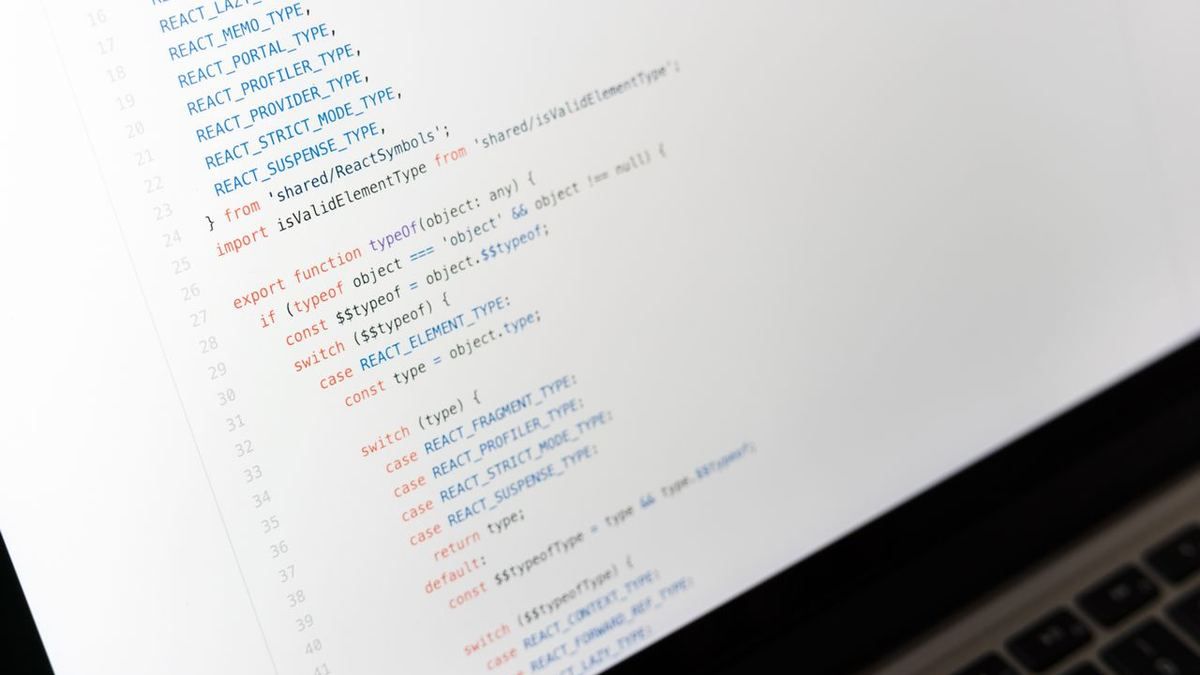 Close-up of code displayed on a laptop screen