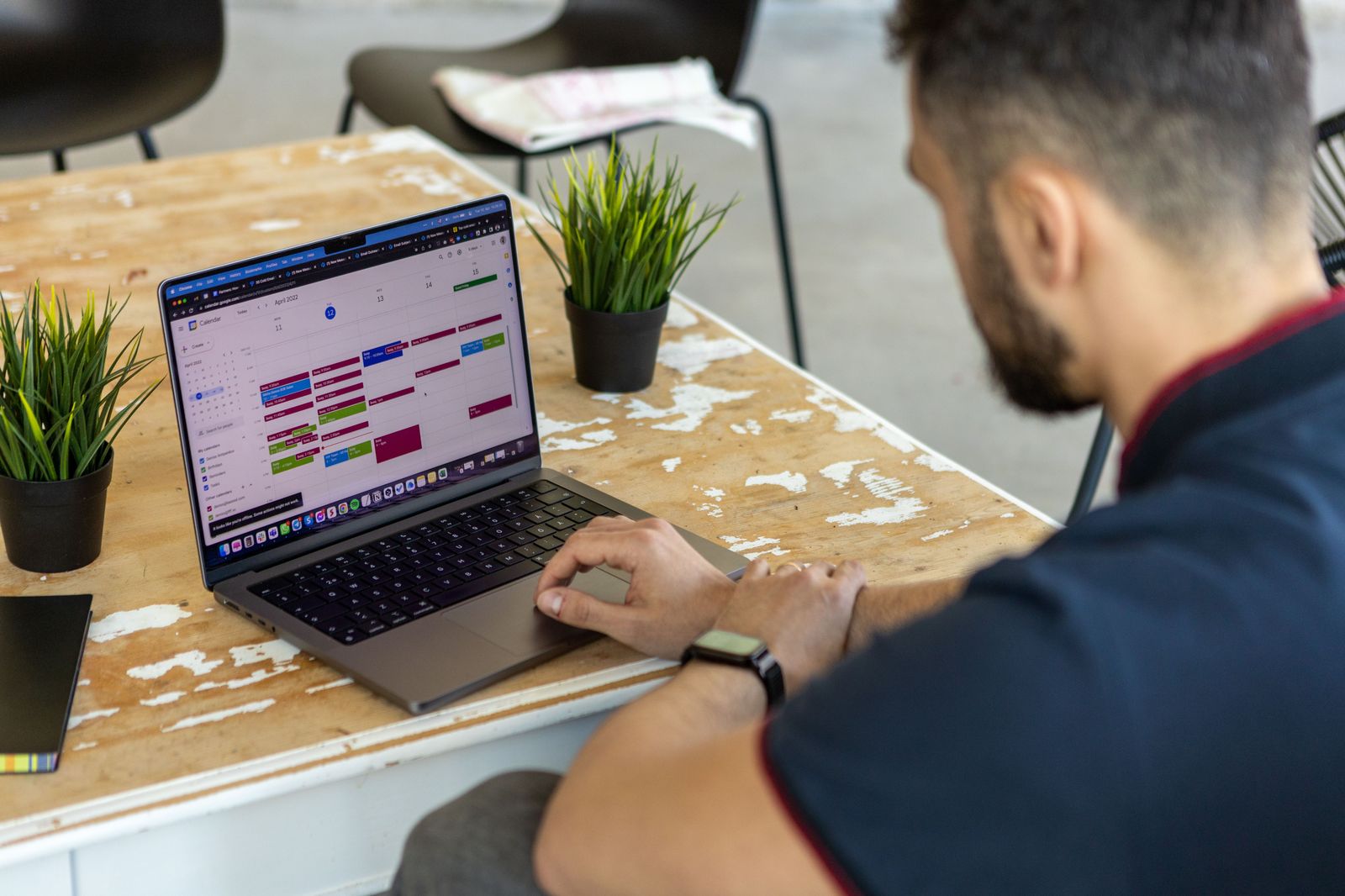 Virtual assistant managing schedules and tasks remotely on a laptop